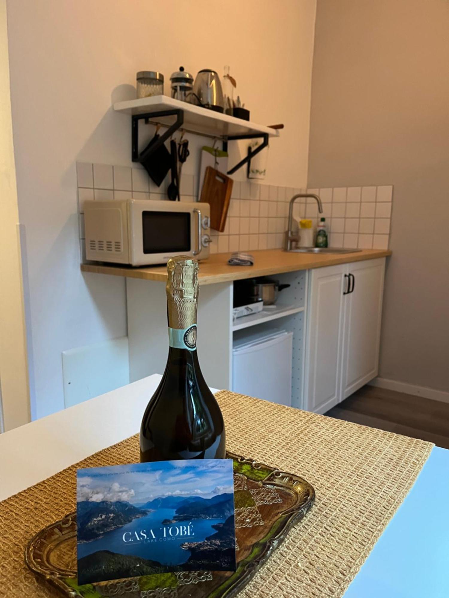 Casa Tobe Apartment Menaggio Bagian luar foto